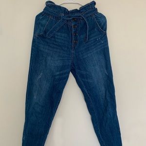 blue high rise jeans with jean belt and buttons